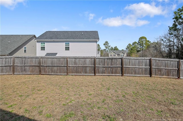 view of yard featuring a fenced backyard