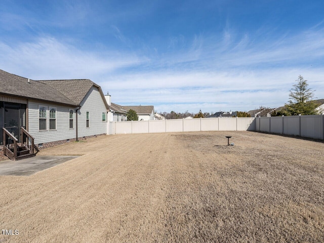 view of yard with fence