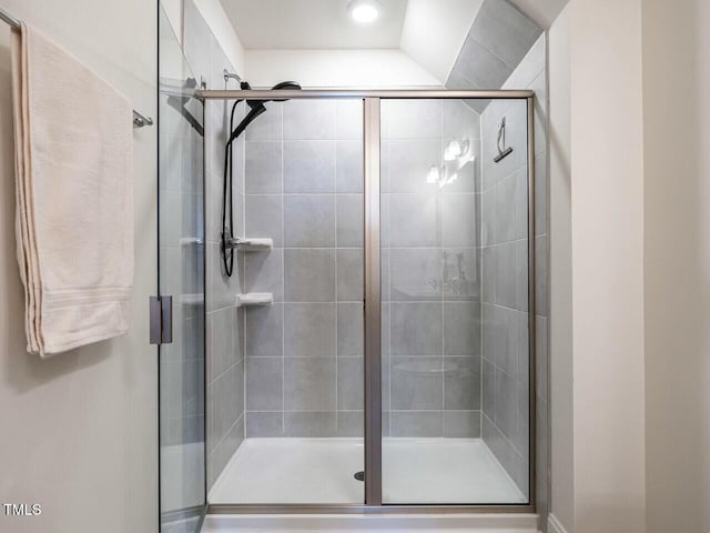 full bathroom featuring a stall shower