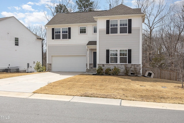 view of front of house with a garage, concrete driveway, stone siding, central AC, and a front yard