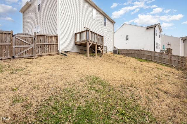 back of house with cooling unit, a gate, fence, and a deck