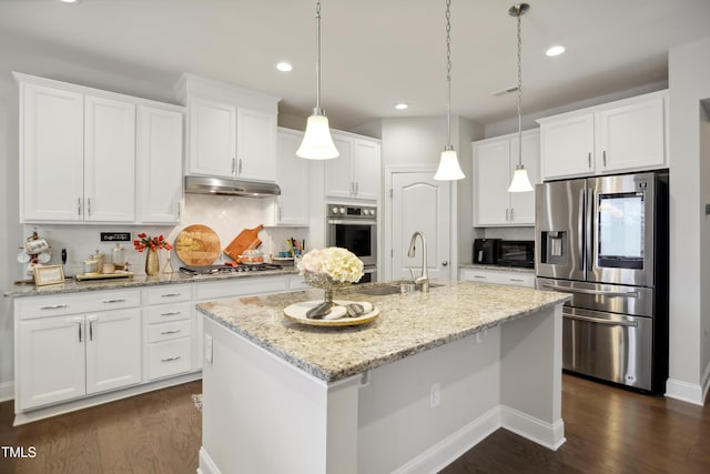 kitchen with stainless steel appliances, white cabinetry, a sink, and under cabinet range hood