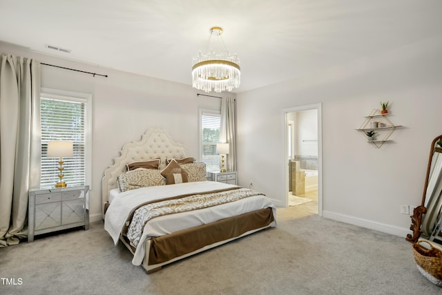 bedroom featuring a chandelier, connected bathroom, visible vents, baseboards, and carpet