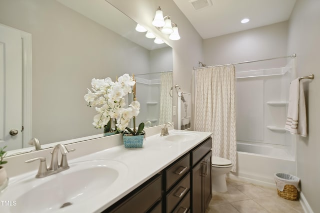 full bath with toilet, tile patterned flooring, visible vents, and a sink