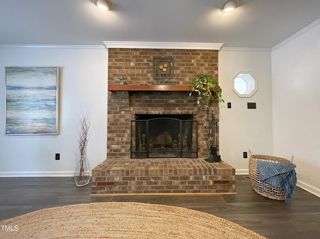 living area featuring a fireplace, baseboards, crown molding, and wood finished floors