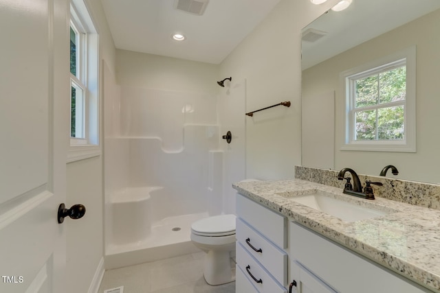 full bathroom featuring toilet, visible vents, walk in shower, and vanity