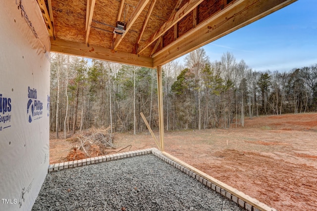 view of yard featuring a view of trees