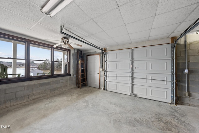 garage featuring concrete block wall