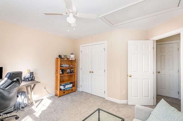 carpeted home office with attic access and baseboards