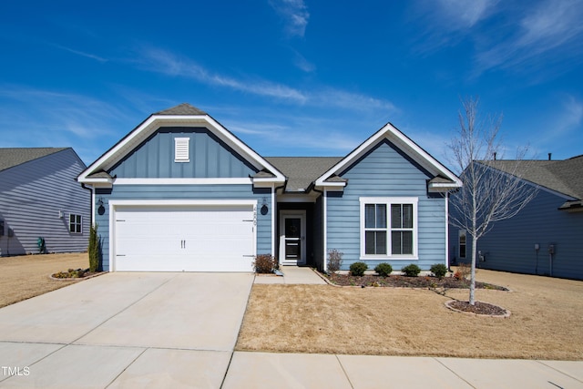 view of front of home with board and batten siding, concrete driveway, and a garage