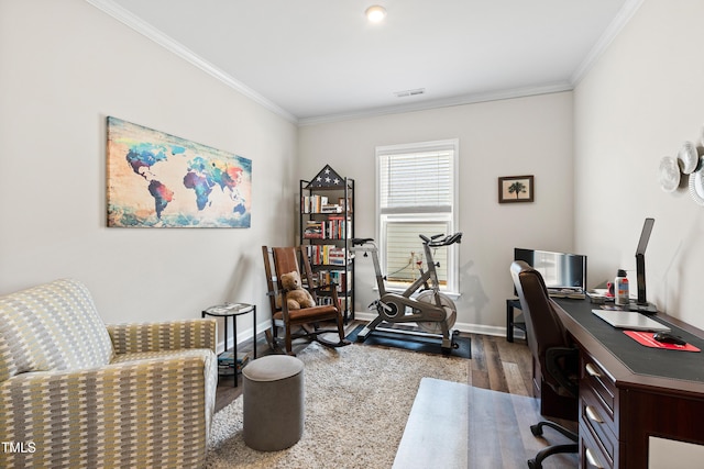 office featuring baseboards, dark wood finished floors, visible vents, and crown molding