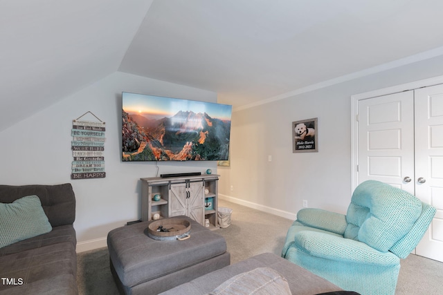 carpeted living room featuring lofted ceiling, ornamental molding, and baseboards