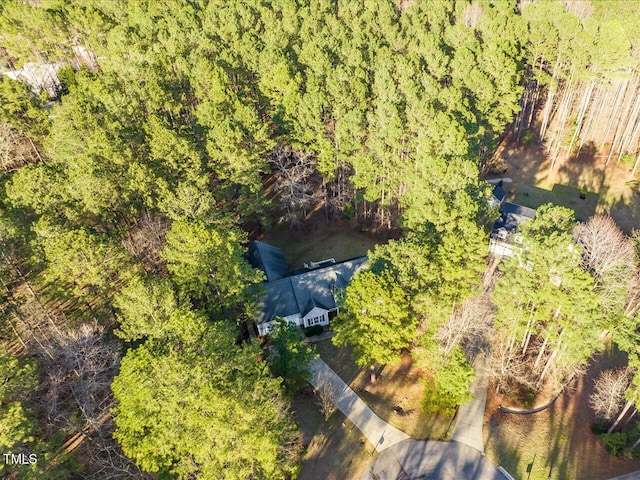 bird's eye view featuring a view of trees