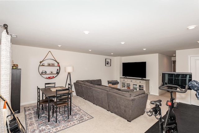 carpeted living room featuring recessed lighting, visible vents, and baseboards