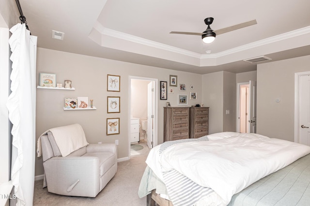 bedroom featuring light carpet, visible vents, a raised ceiling, and ornamental molding