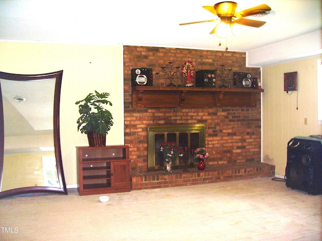 living room with a brick fireplace and ceiling fan