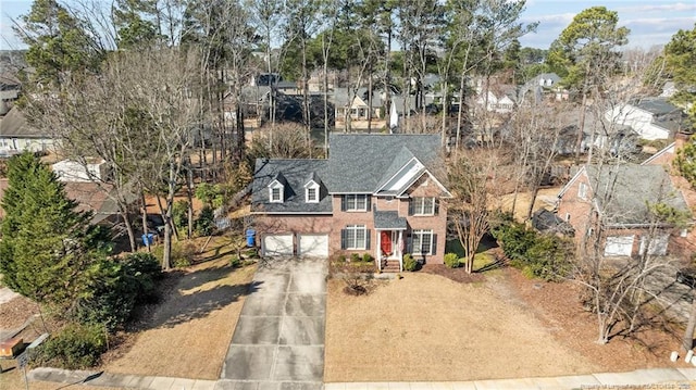 view of front facade with a garage and driveway