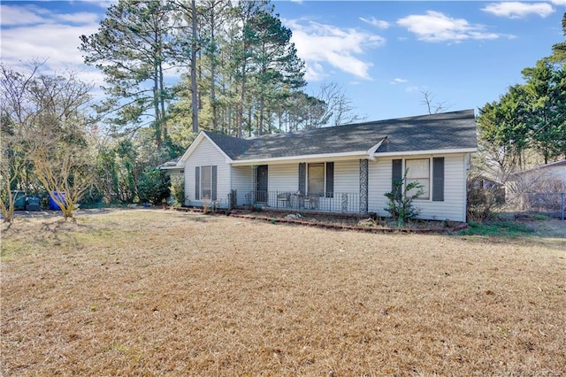 single story home with a front lawn and a porch