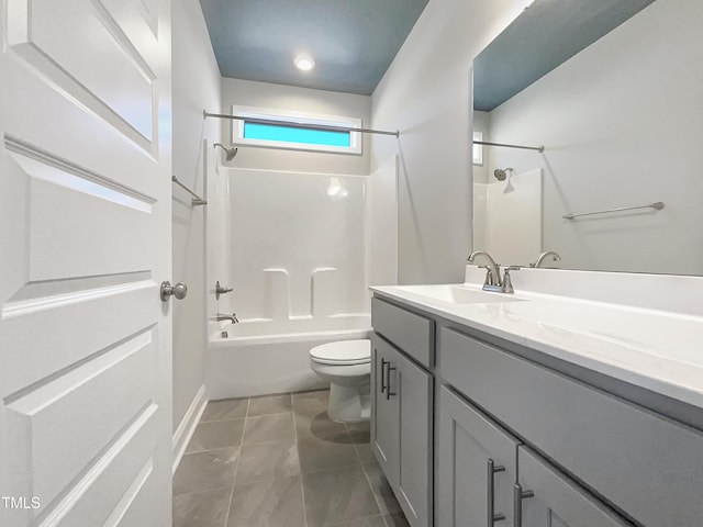 bathroom featuring shower / bathing tub combination, vanity, and toilet