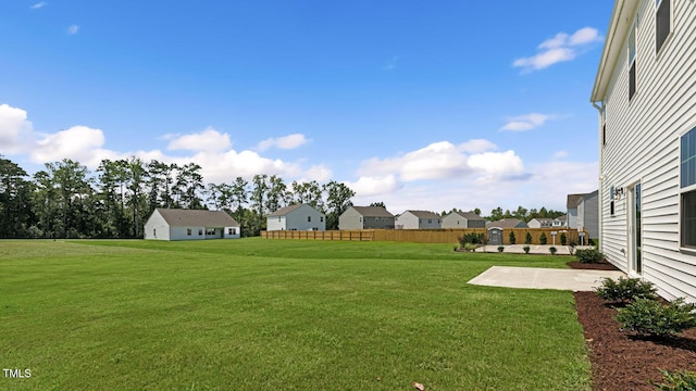 262 Hartfield Ave, Raeford, NC 28376 - view of yard with a patio, fence, and a residential view