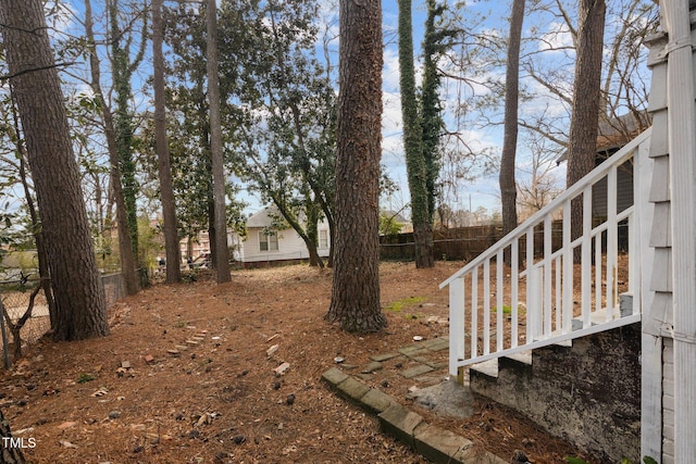 view of yard with fence