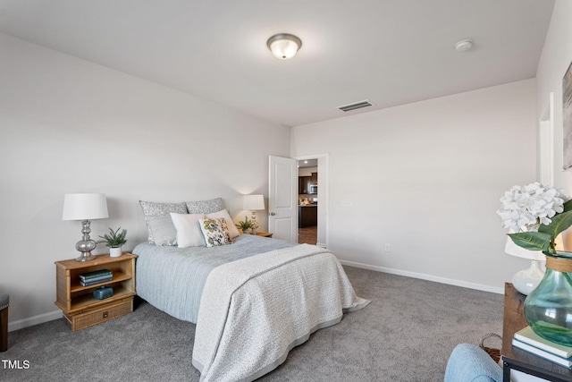 bedroom featuring carpet, visible vents, and baseboards