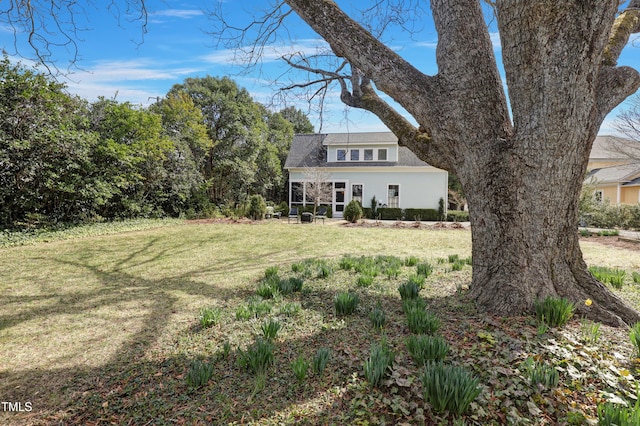 exterior space featuring a front lawn