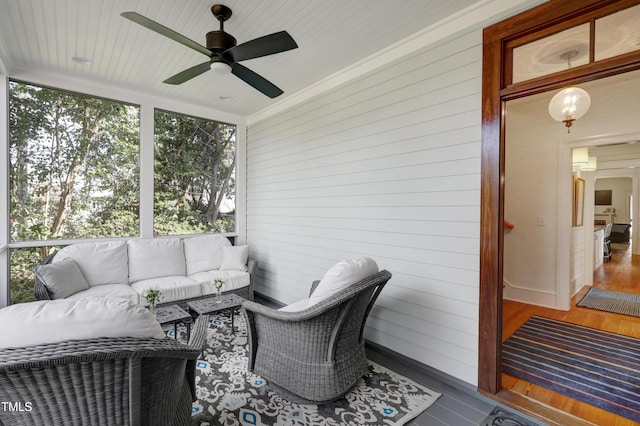 sunroom / solarium with ceiling fan