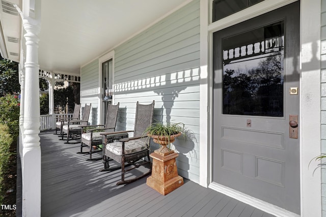 deck featuring covered porch