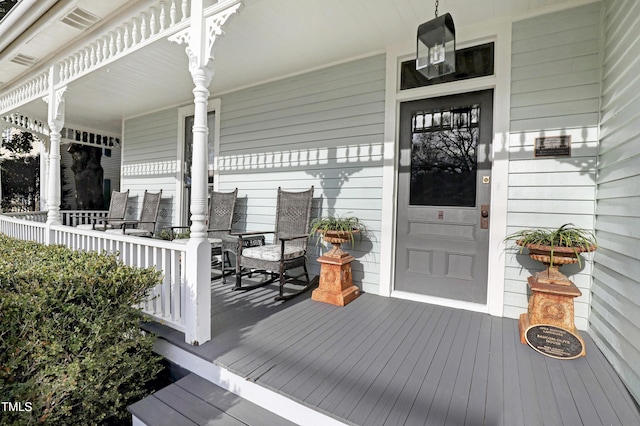 deck with covered porch