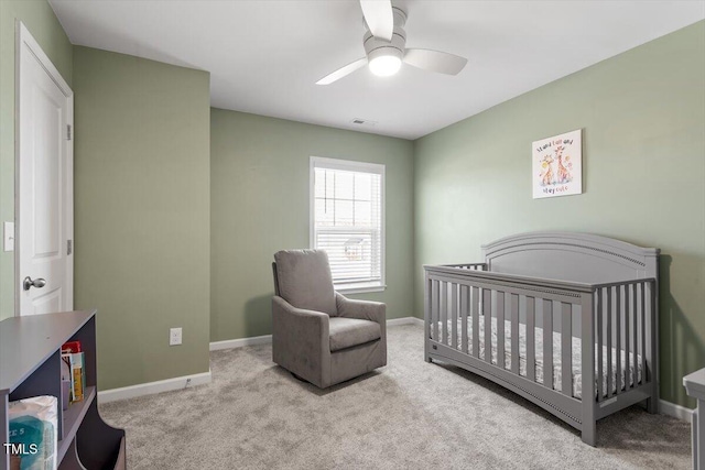 bedroom featuring carpet floors and baseboards