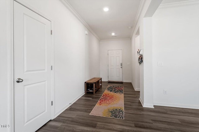 doorway featuring dark wood-style floors, recessed lighting, crown molding, and baseboards