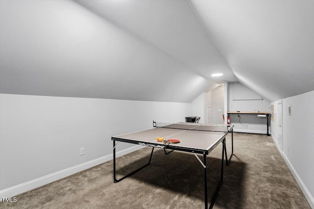 game room with baseboards, vaulted ceiling, and carpet flooring