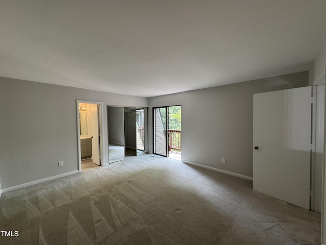 159 Finley Forest Dr, Chapel Hill, NC 27517 - unfurnished bedroom with light colored carpet, access to exterior, baseboards, and ensuite bathroom