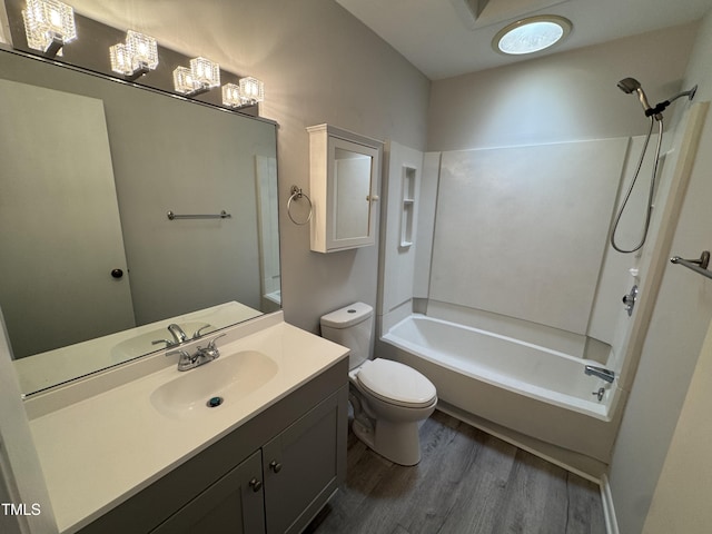 159 Finley Forest Dr, Chapel Hill, NC 27517 - bathroom with wood finished floors, toilet, bathing tub / shower combination, vanity, and a chandelier