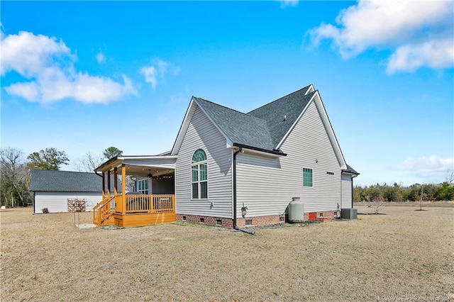 view of home's exterior with a shingled roof, crawl space, a deck, and central air condition unit