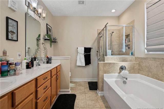 full bathroom featuring a sink, visible vents, a shower stall, a bath, and tile patterned floors