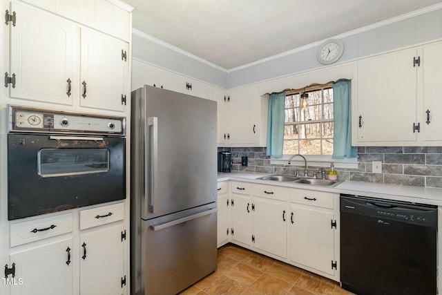 kitchen featuring crown molding, backsplash, white cabinets, a sink, and black appliances