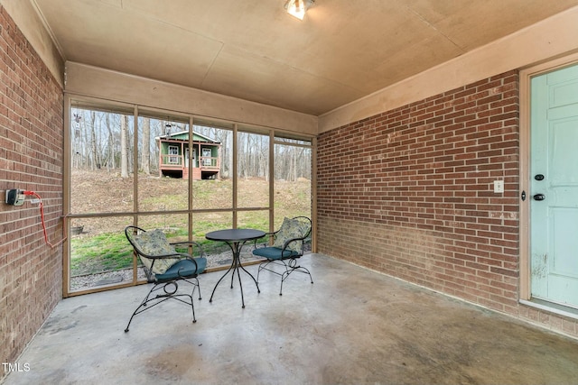 unfurnished sunroom with a wealth of natural light