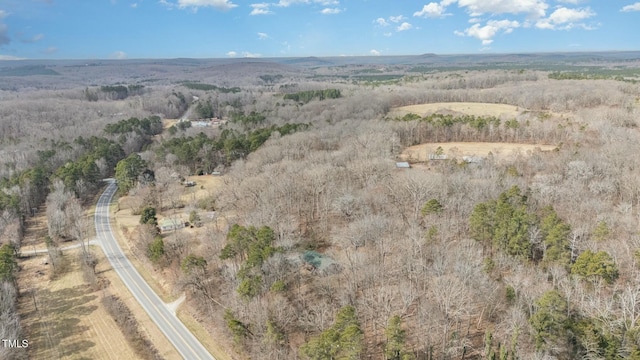 birds eye view of property with a rural view