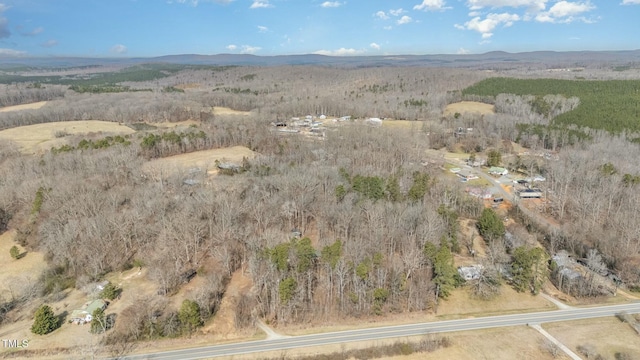 drone / aerial view featuring a mountain view