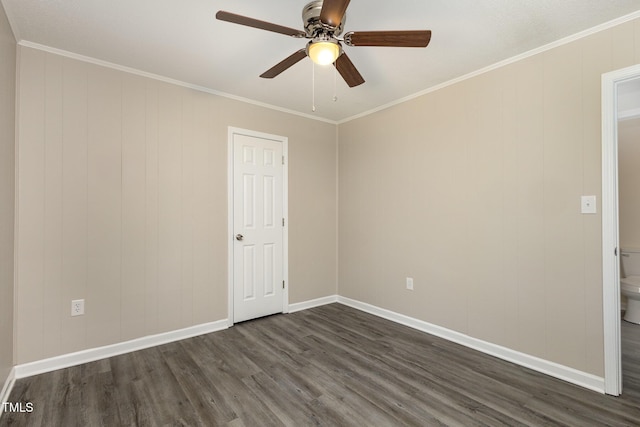 unfurnished room featuring a ceiling fan, crown molding, baseboards, and dark wood-style flooring