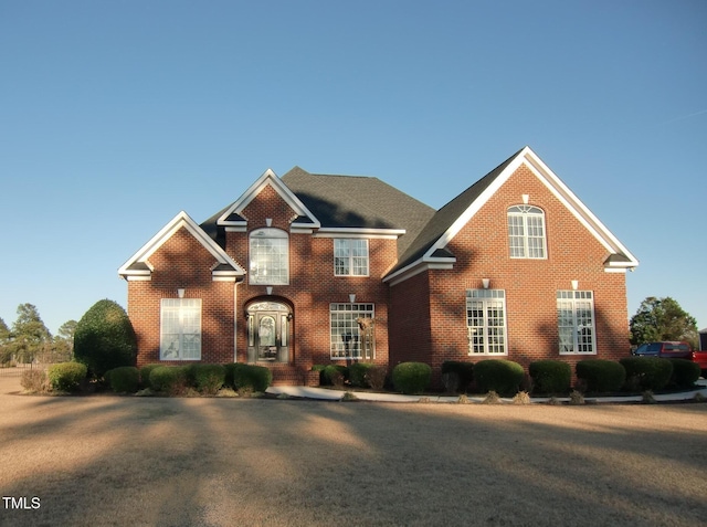 view of front facade with brick siding