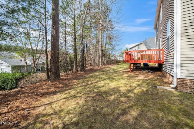 view of yard with a deck