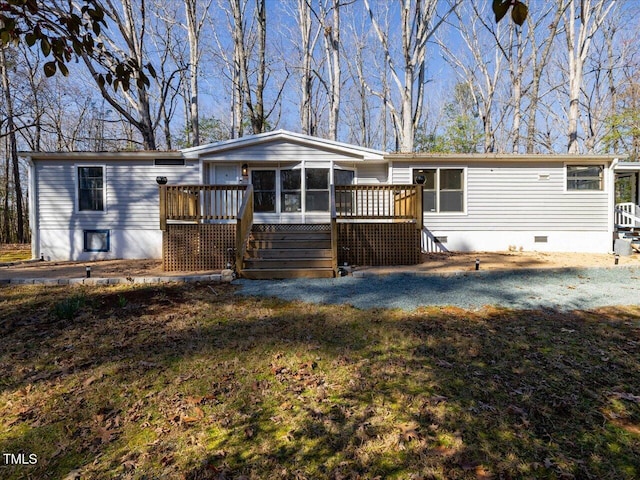 view of front facade with crawl space and a wooden deck