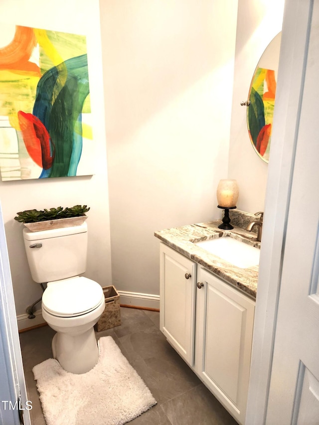 155 Georgetown Woods Dr, Youngsville, NC 27596 - half bathroom featuring toilet, vanity, and baseboards