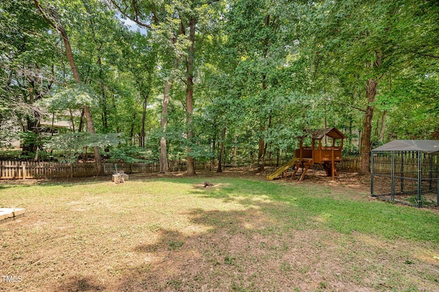 155 Georgetown Woods Dr, Youngsville, NC 27596 - fenced backyard featuring a playground