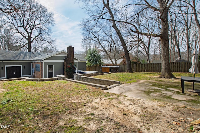 view of yard with fence