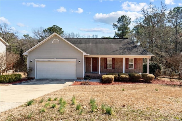 single story home featuring concrete driveway, brick siding, and an attached garage