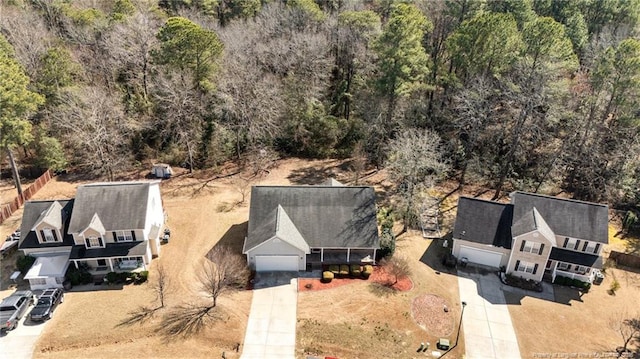 bird's eye view with a forest view